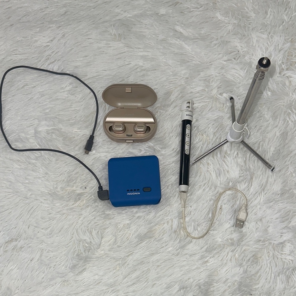 Anker Blue Power Bank, Beige Earbuds and Black Tripod/Selfie Stick
